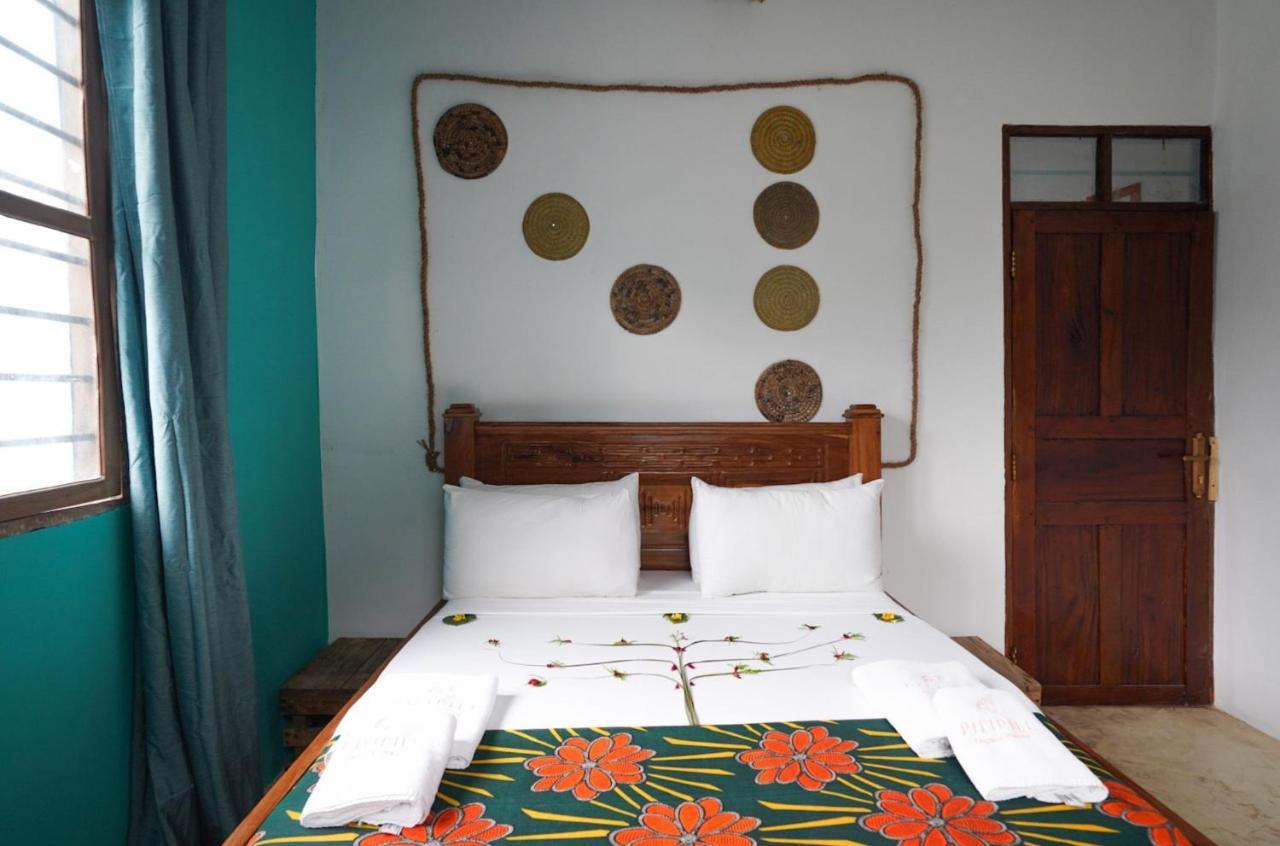 Pili Pili Swahili Lodge Джамбиани Экстерьер фото